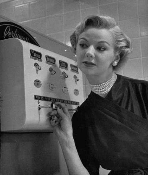 mrsdentonorahippo:  A coin-operated perfume dispenser - 1952 