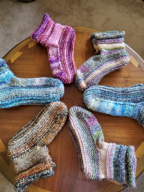 Holiday Family Mukluks, as a part of my fully homemade Christmas!  Six pairs of stripey, squishy goo