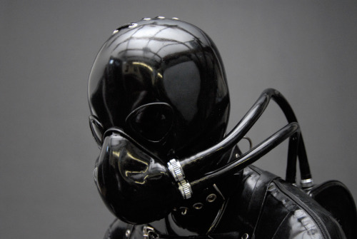 LOCKED IN RUBBER adult photos