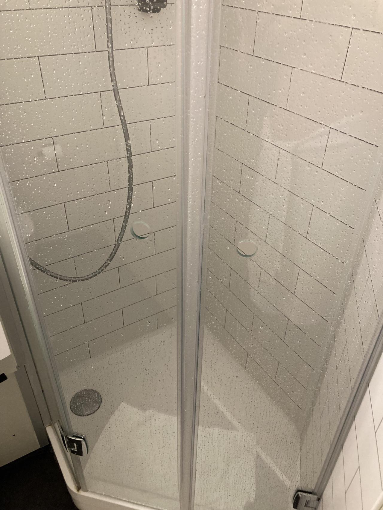 Apparently handles are too much - two holes in the shower door at our hotel in Paris Source: CrappyDesign #design#LOL#funny