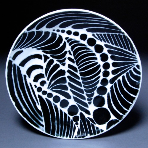 Glaze-Carved Dinner Plates, 2014by Emily Rose Bourne Thrown porcelain with black and white glazes fi