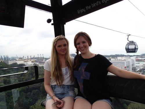 my sister and I on the cable car in singapore to Sentosa Island… literally one of the best da
