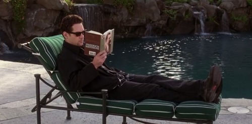 piratelawyer:what a 90′s dreamboatwearing all black poolside in LAand reading nietzsche