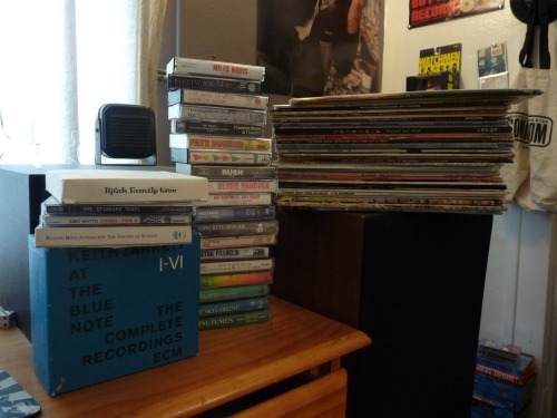 play-catside-first:  play-catside-first:  These are all the LPs, tapes and CDs I’ve amassed that I’ve never listened through. I intend to get through these guys before Winter break is over.   Uh oh. Today is the last day of break and I’m pretty