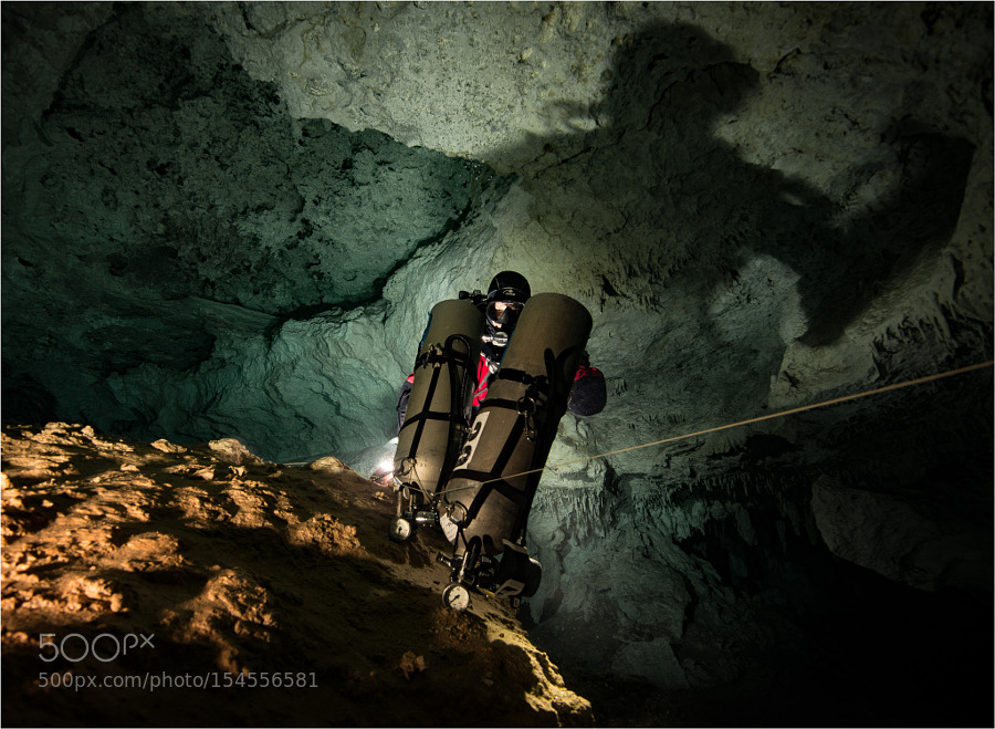 socialfoto:  Shadow on the Wall Cave Diver in the Cave “Dos Pisos” coming back