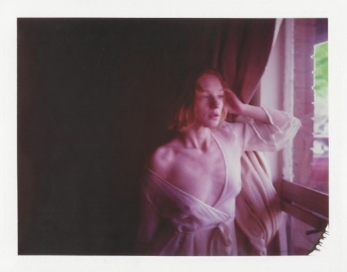 coconutdreamin:   PROVivid Polaroid 689 that expired in 2003 Ruby Slipper by Miya Bird / November 20