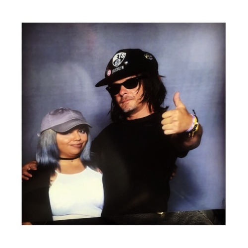 Norman he smacked my back and said boooom when they took our pic lol.