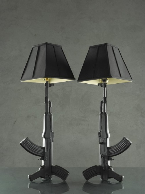 gunrunnerhell:  Loaded Objects Ceramic Need new lighting fixtures? These are ceramic lamps cast to mimic firearms. They’re a bit pricey (about 躭.00 for the AK lamp, and 跥.00 for the triple handgun lamp and 贝 for a single handgun wall lamp),