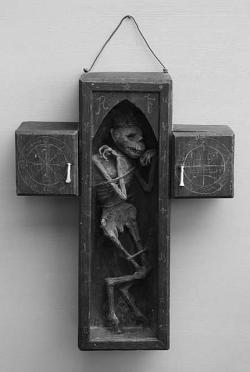 areyou-stillawake:  The Faustian Cross by Curiomira  The physical manifestation of a lesser daemon, bound in a wooden cross. 