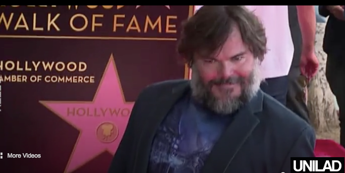scarecrow-hero: scarecrow-hero:  So Jack Black got a star on the Hollywood Walk of Fame and was posing for pictures and   The face of a man who knew exactly what he was doing when they panned over his outfit. 