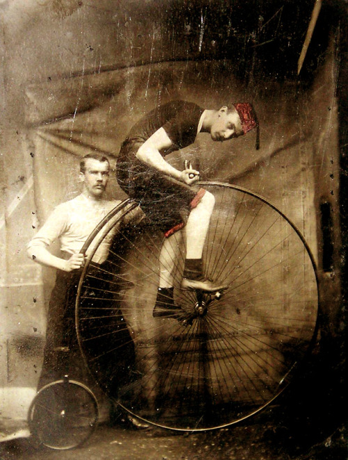 Two men with a penny-farthing, late 19th c.
