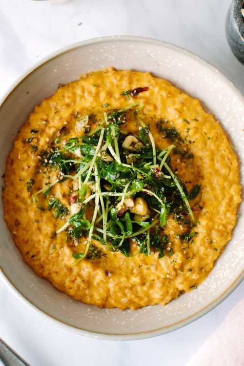desvre:SUNFLOWER CARROT RISOTTO WITH HAZELNUT-PEA SHOOTS (Source)