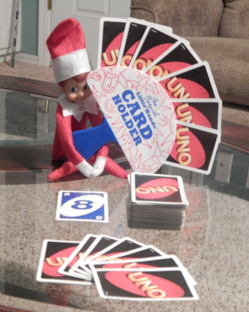 Elf on the Shelf Plays UNO DJ the elf wanted to play UNO for family game night.