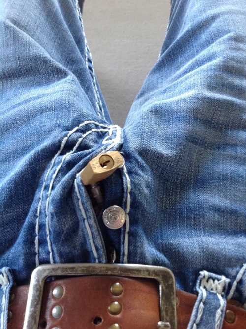 chasteguysandkink: lockedboi:  kinkilike:  Tightly packed under my jeans before a shopping trip, no one will know!!  Awesome  It’s always hot to just have the lock show outside your jeans. Even hotter is to pull it hard :D 