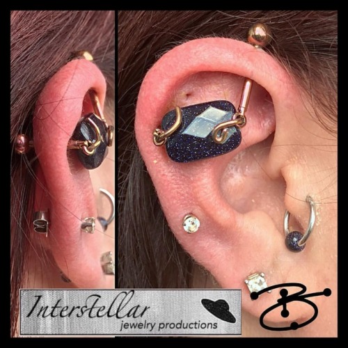 Fun industrial piercing using a beautiful faceted cut blue gold stone from @interstellarjewelryprodu