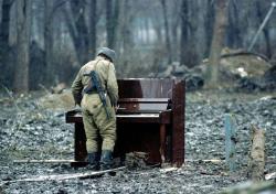Architectureland:  A Russian Soldier Playing An Abandoned Piano In Chechnya 