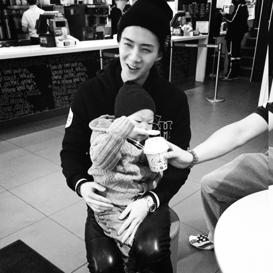 melonhun: a baby holding a baby
