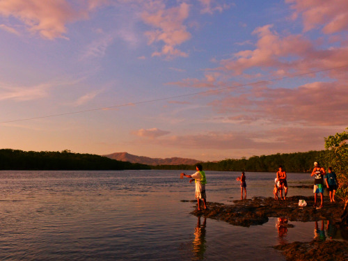 Local family fishing in Tamarindo, Costa Rica. I guess all of them had been waiting there for some t