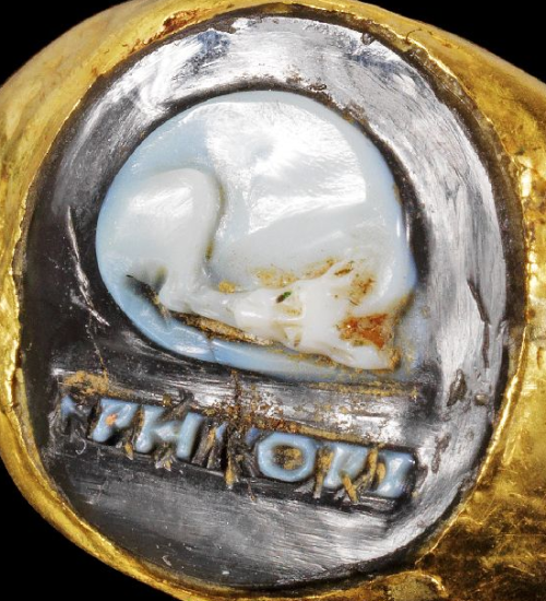 archaicwonder:Roman Gold Ring With Agate Cameo Depicting a Sleeping Dog and Greek Inscription, 1st-2
