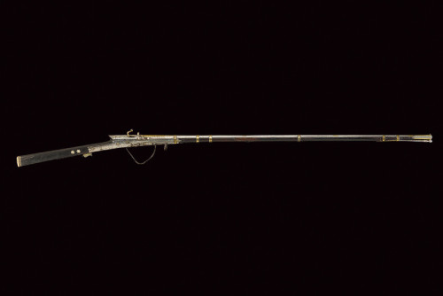 Gold and silver inlaid matchlock toreador musket, India, 18th century.