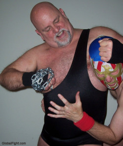 wrestlerswrestlingphotos:  chain fighting match gay daddy bear