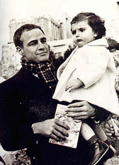 Marlon Brando visited Greece to support children’s orphanages in 1958. All the cheeks in this photo 