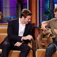 briggspaul:armie hammer playing with a baby grizzly bear on the tonight show (x)
