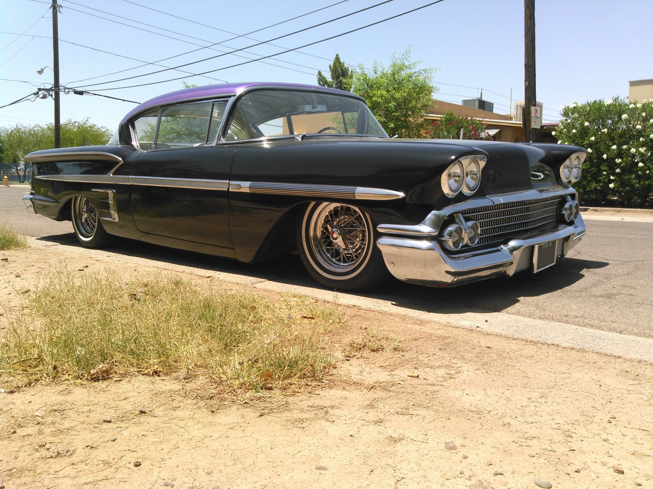 justneedsalittlework:  Awesome ‘58 Chevy Impala spotted in downtown Phoenix, Arizona.