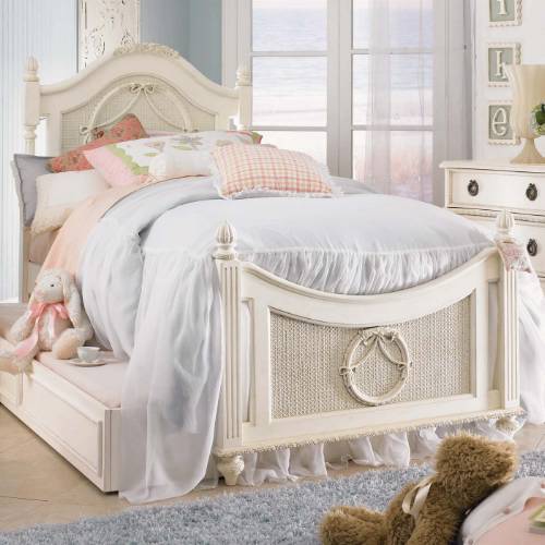 An adorable antique twin bed.