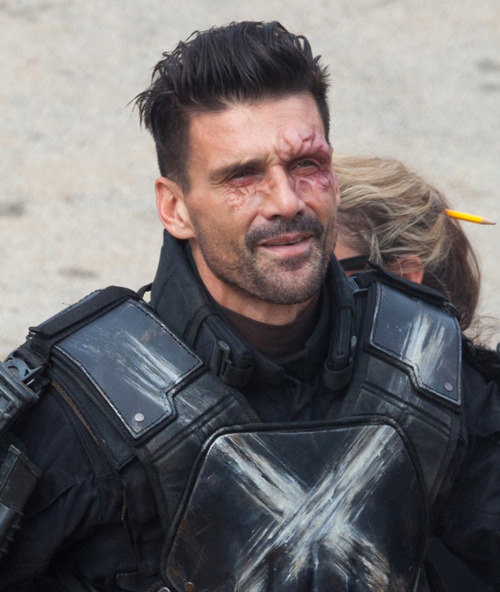 kingdomdaily:  Frank Grillo waves to the photographers while walking around set between takes of Captain America: Civil War on Monday morning (May 18) in Atlanta, Ga.The 49-year-old actor took off his mask and showed off some special effects scarring