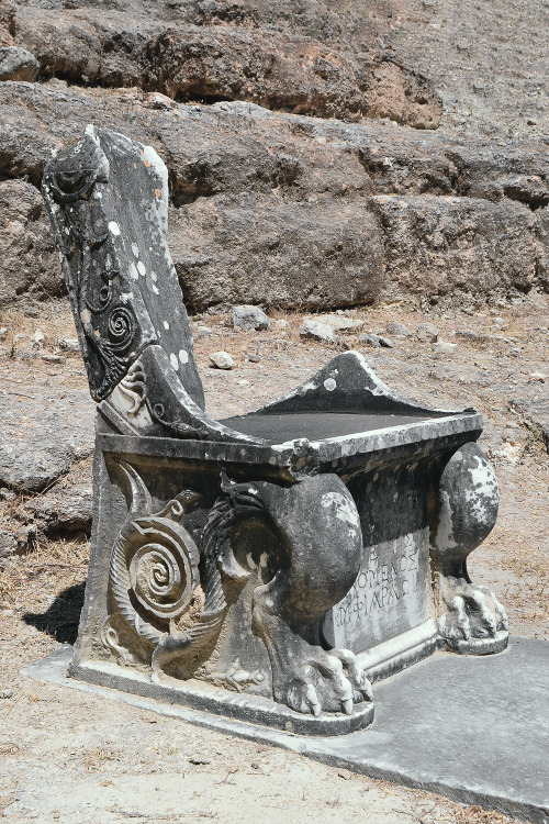 Marble prohedria seat in the theater at the Amphiareion of Oropos, Attica, Greece. (2nd century BC.)