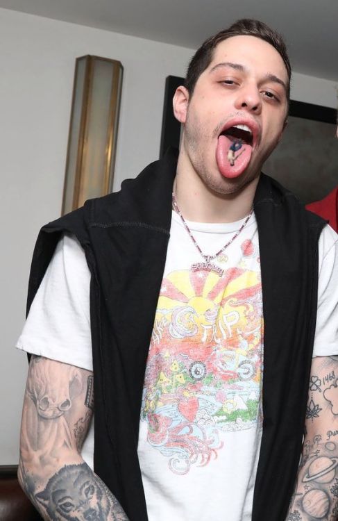 macro-collections:Comedian Pete Davidson enjoying a tiny snack.