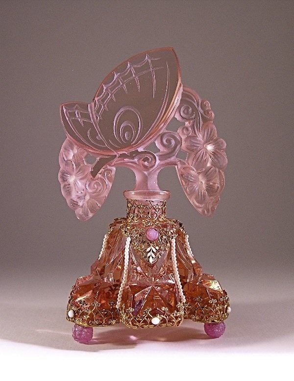 fawnvelveteen:  1920s perfume bottle and stopper in pink crystal with enamel and