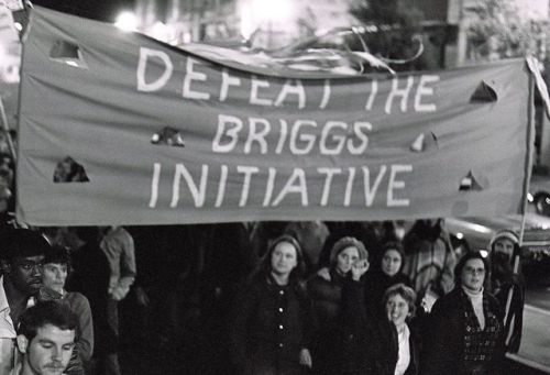 “DEFEAT THE BRIGGS INITIATIVE,” demonstrators in San Francisco react to the rejection of Eugene, Ore