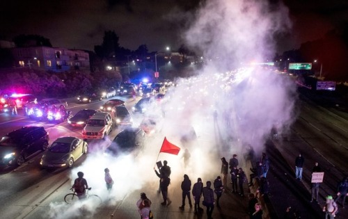 Protesters block both directions of the Interstate 580 freeway during a rally against racism in resp