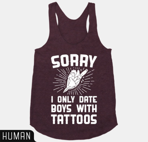 ambhuurr: There is just something about a man with tattoos. Red Tank  |  Black Baseball T