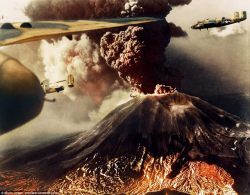 historicaltimes:  Fire and fury: B-25s are pictured flying past Mount Vesuvius in Italy as lava and ash spews from the top of the volcano. The eruption killed 57 as it destroyed the village of San Sebastiano and San Giorg in March 1944 while Allied forces