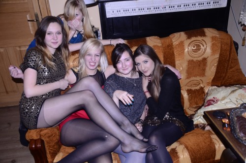 Hotties with short dress flashing legs in sheer black pantyhose.Woman in pantyhose