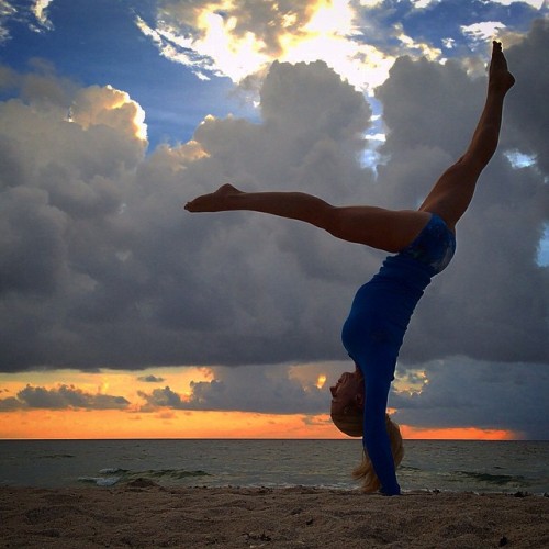 Feel it. Whatever it is &hellip; Feel it. #feel #love #handstand #beach #beachyogagirl #sky #clouds