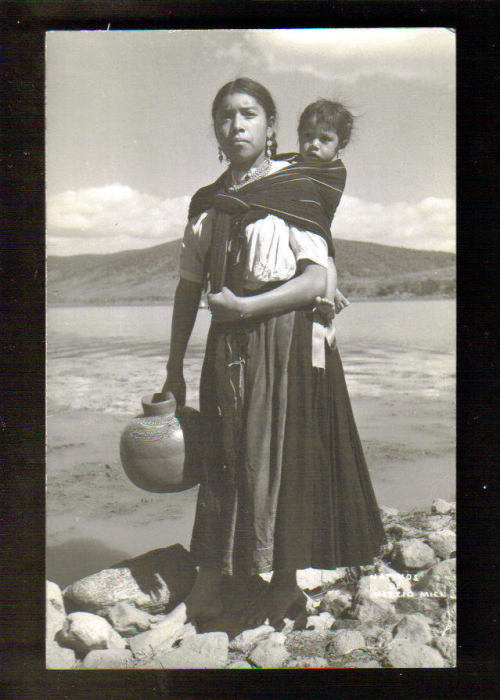 indigenous-maya: Native Purepecha mother and her child standing on the shore of Lake Patzcuaro in Mi
