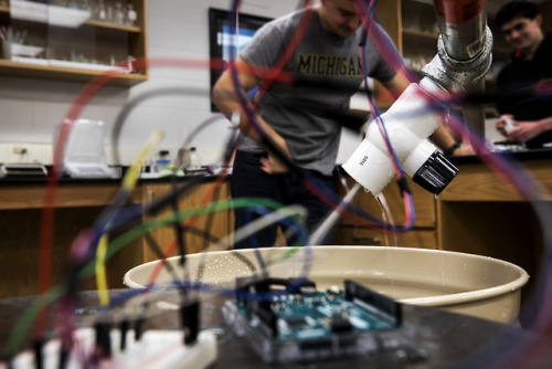 Alexander Hoppe, CoE First-Year Student, tests pipe sensors built for ENG 100: Smart Water Systems i