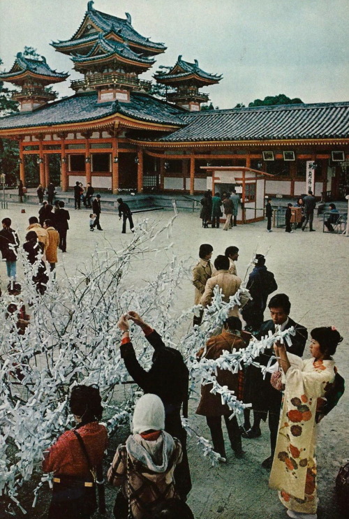 vintagenatgeographic:Heian Shrine in Kyoto, Japan. For good luck, celebrants buy fortunes scratched 