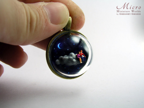 One of my miniature world pendants - A man and woman are riding a cloud through the starry night, cl