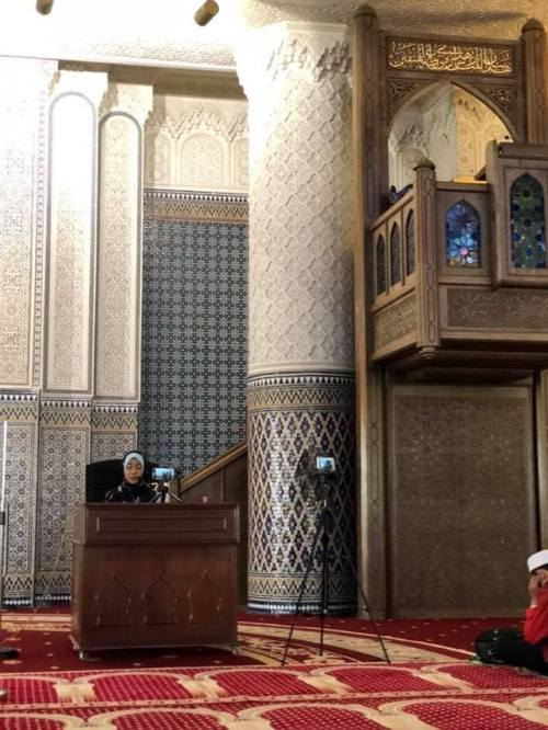 A shaykha teaching a mixed gender class at the National Mosque of Malaysia, Masjid Negara, in Kuala 
