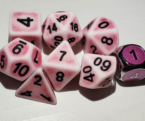 Ancient Pink Dice and a freebie D6 from Die Hard Dice