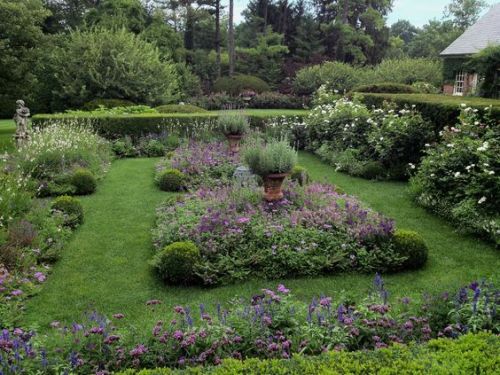 Cottage garden with purples by Karl Gercens