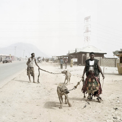 titytwochainz:  hip-hop-quest:  liftedandgiftedd:  keepbangin:  cenobiteme:  Nigeria’s Hyena Men by photographer Pieter Hugo   thats dope  this is raw as fuckk  real thugs  fuck yo pit bull 