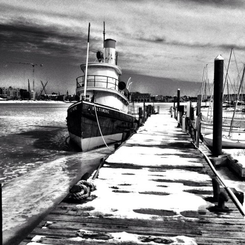 Snow And Ice Covered Harbor. The Steam-powered Tugboat, Baltimore, Built In 1906, Was Declared A National