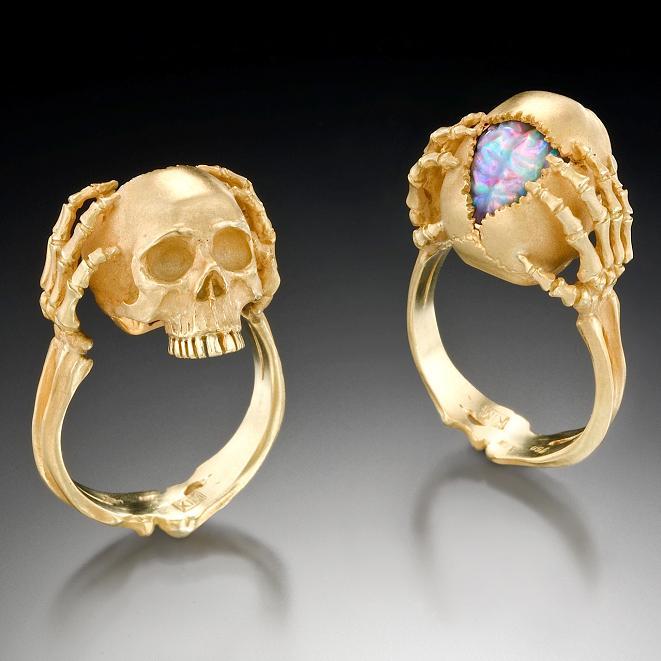 sixpenceee:  Tribute to a genius: An 18k gold skull ring with a carved australian