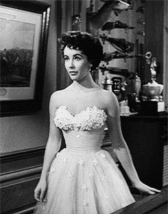 barbarastanwyck:  Elizabeth Taylor wearing an Edith Head designed dress in A Place